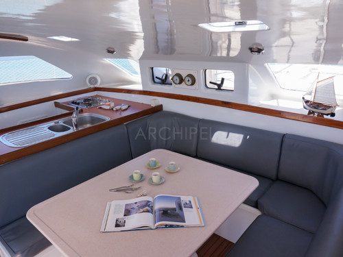 The panoramic galley and lounge allow access to the cabins and bathrooms.